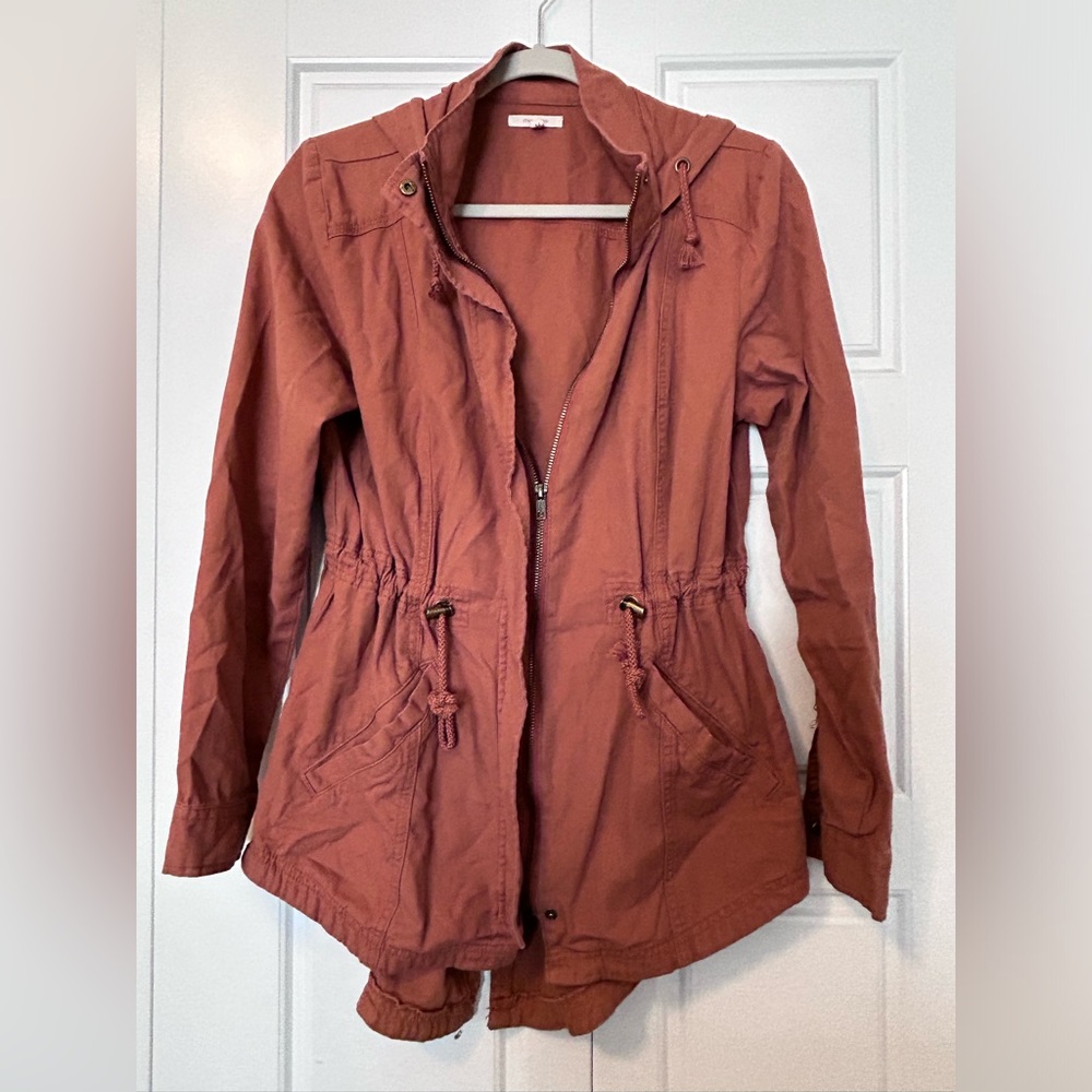 Orange Maurice's jacket